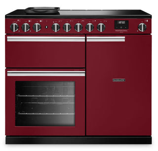 A red and black Lancer range cooker with chrome knobs, a digital display, and silver handles, shown on a white background.