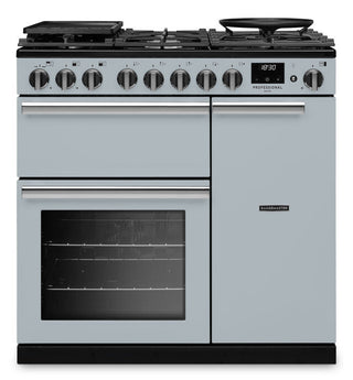 A freestanding dual fuel range cooker in a light gray finish with black accents, featuring a gas stovetop, oven, and side door, photographed on a solid white background.