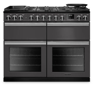 A black gas range stove with four burners, a rear grill, two upper oven compartments, and two lower oven compartments with glass doors, shown on a white background.